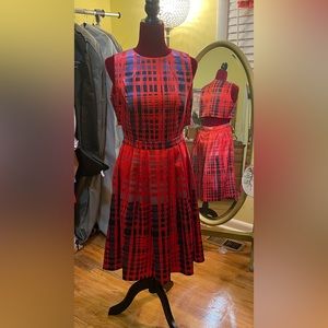 Gorgeous Party-holiday-cocktail dress with open lower back, pleats, and pockets.